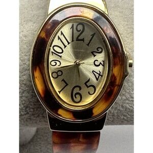 Avon Ladies Cuff Watch F3111441 New Battery 29MM 6.25" Faux Tortoise H15